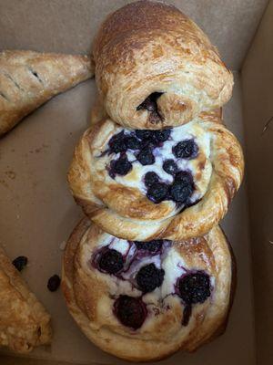 A Croissant and fresh blueberry danishes