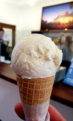 Single scoop vanilla cone.