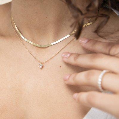 Herringbone necklace with baguette diamond necklace