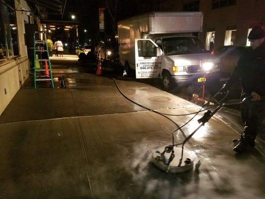 Pressure washing storefronts, concrete with hot water, bubble gum removal