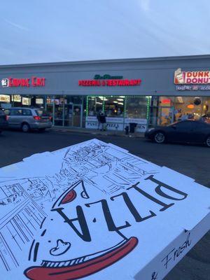 Couldn't help myself , two slices huge box that tells you how big of a portion the pizza is