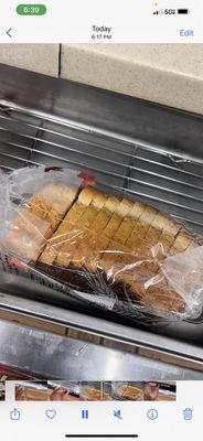 The loaf of bread in the bun drawer.