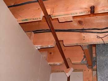 FLOOR JOISTS DAMAGED BY PLUMBER