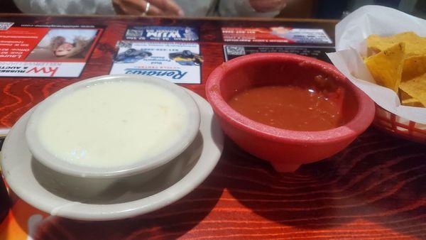 Good food here but this queso and salsa are both a  watery runny mess.