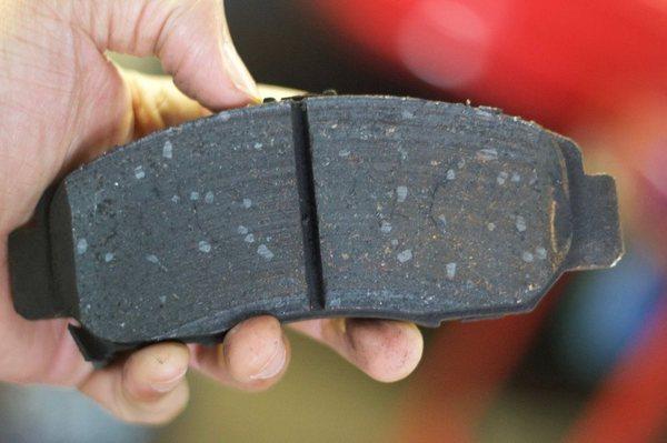 Fresh brake pad ready to be installed