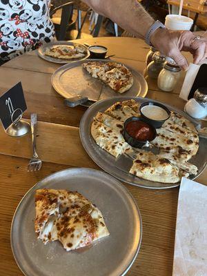 Wood fired beef, pizza, and cheese bread