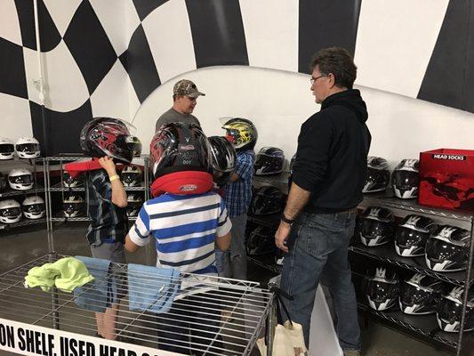 John (the owner) helping my family out finding their right helmet sizes