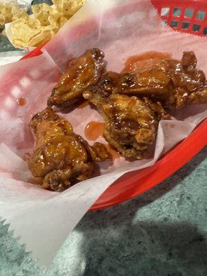 Wings with their special sauce.