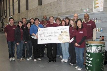 Credit union staff volunteers at SF Food Bank