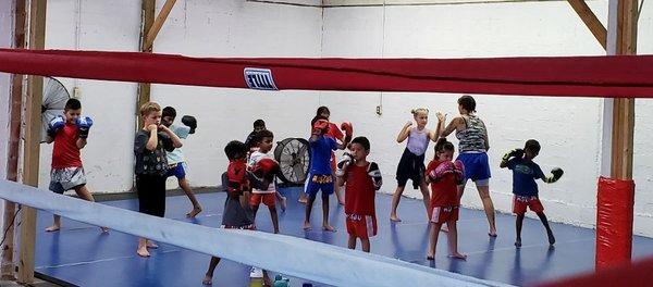 Level 1 kids. Working on stance with correct punching technique