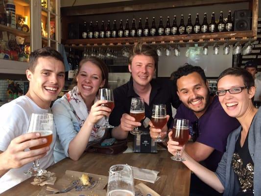 Enjoying empanadas and locally brewed beer on our Pint - Parks - Politics tour.