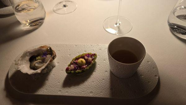 Part of the tasting menu.   Some oysters, wagyu beef tartare, and apple cider.