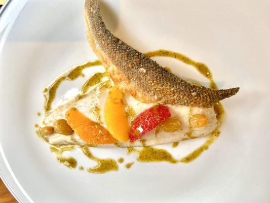 Bass fillet with pistachio, citrus, and raisins