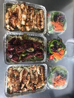 Grilled chicken and steak tips dinner with rice and salad