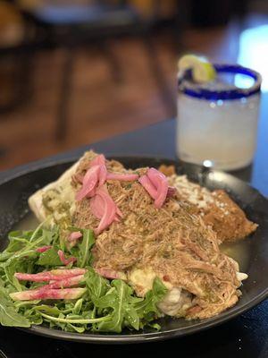 Smothered pollo burrito with pork green chile, house margarita