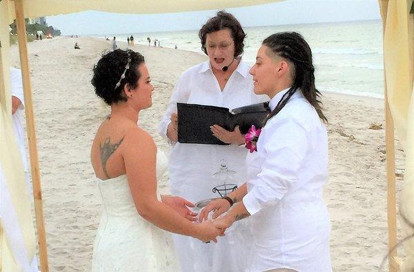 2 lovely ladies tying the knot on the beach