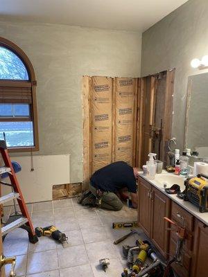 Removal off corner shower 
 We removed cabinets that were under window