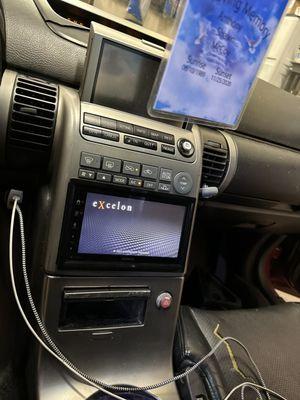 New double din Radio they installed and they even got my factory control center back up and working.