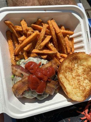 Bacon cheeseburger with sweet potato fries.