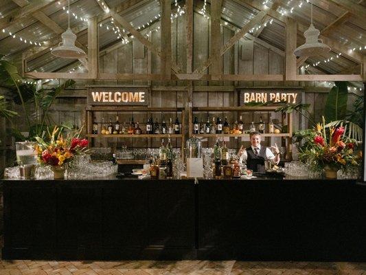 They built a bar from scratch in a barn!