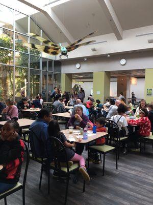 Packed tables at the Acro Cafe. Please be kind and bus your own table.