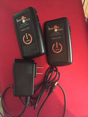 Two battery packs and a charger