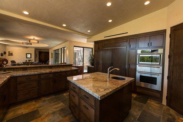 Custom cabinets with matching refrigerator face.