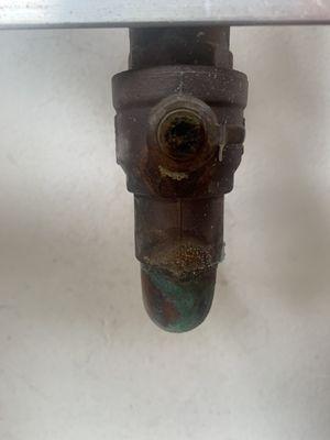 Old water pressure valve with broken shut off valve.