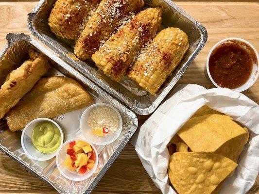 Mexican Street Corn, Empanadas, Chips and Salsa