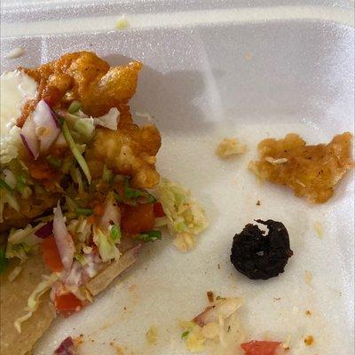 I ordered 4 fish tacos and when I bit into my third one I bit into this super burned little shrimp. Disgusting