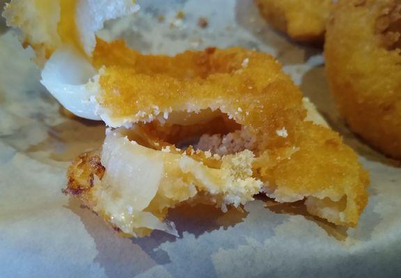 Onion Rings were raw with dry breading inside