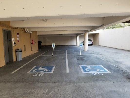 We have disabled parking spaces located in our underground garage, right next to the elevator.