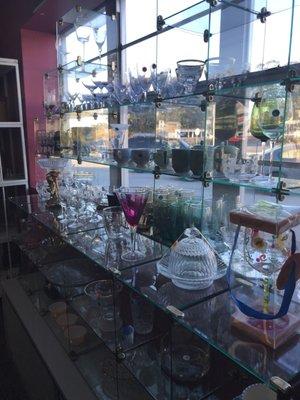 Lots of sets of estate quality dish sets and glassware.