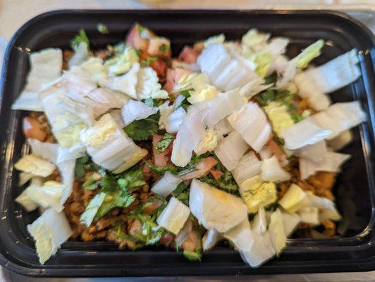 White rice, red pinto beans, beef, pico de gallo, and lettuce bowl