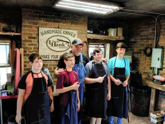 Boy Scout troop making their own knife