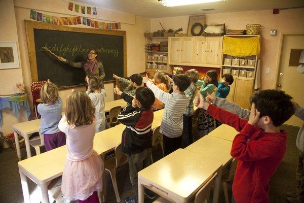 Second grade learning cursive.