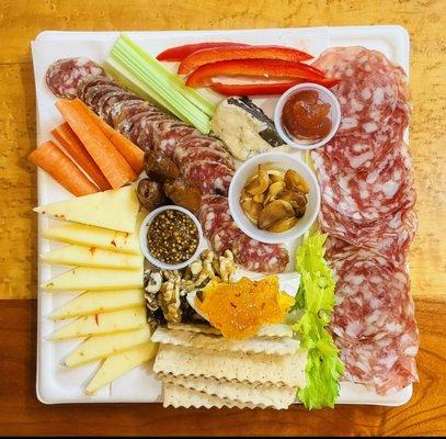 On Demand Cheese & Charcuterie Trays made with local and regional ingredients.