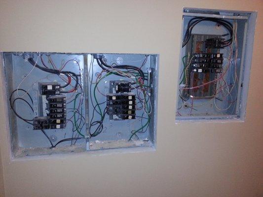 Uncovered Electrical Panels, we remove the covers to inspect a property's wiring.