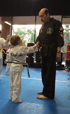 Mr. Prieto honoring my son with his white stripe belt