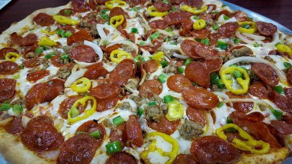 The 16" Paps Special with sausage, pepperoni, onions, mushrooms, green peppers & banana peppers.