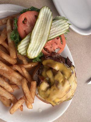 Wagyu bacon cheeseburger W/ fries. Perfectly cooked (medium), juicy and delicious.