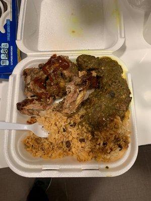 Jerk chicken and curry goat with rice and peas