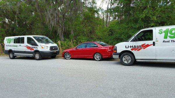 This is our red car parked legally on a public street, boxed in by Compass's maniacal manager/employee just to annoy us.