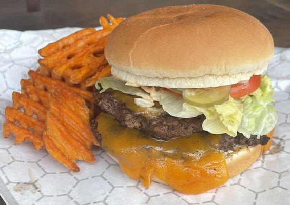 Classic locally-sourced cheeseburger with sweet potato waffle fries