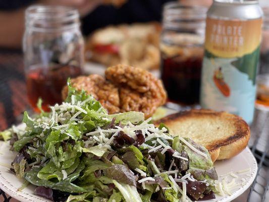 Salad and fried chicken sandwich  Booneshine Palate Painter beer