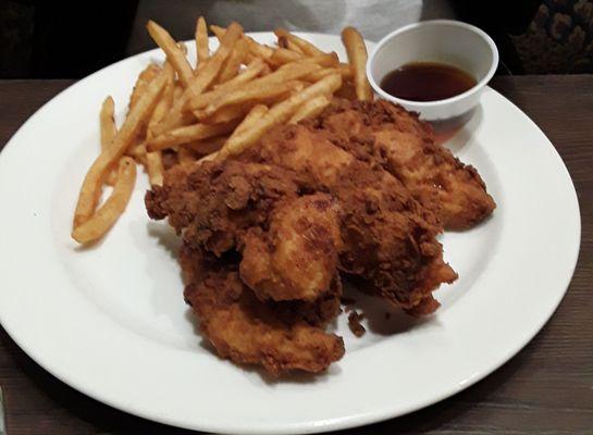 Chicken Tenders with honey, French fries.  So tender and Delicious  Had the Brusceta bread with herbs and olive oil. EXCELLENT