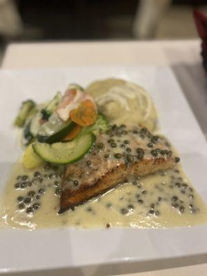 Salmon with lemon and caper sauce.