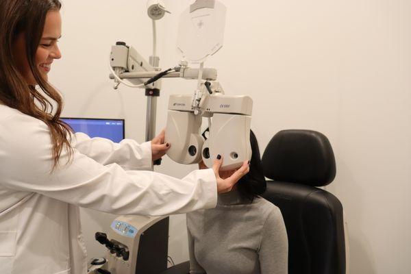 Doctor using eye machine