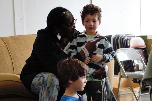 Child and his teacher at Growing Together.