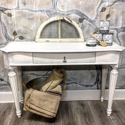 A lovely console solid wood console table. Both the table and the stone wall were hand painted using all Annie Sloan products!